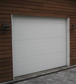 El-drevet leddelt garageport, 300x230 cm. med 3 fjernbetjeninger. Model 3 Denne auktion er annulleret - se nu vare 1935958