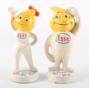 Par Esso sparebøsser af støbejern. 2