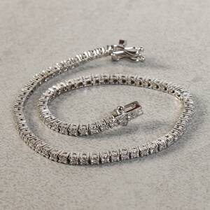 TENNISARMBAND, Diamanter 1.48ct, vitguld