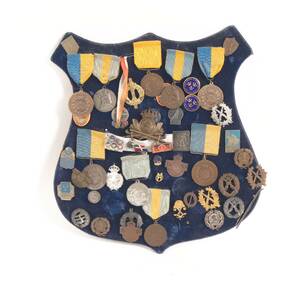 Medaljsköld, mestadels 1900-talets första hälft