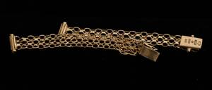 Klockarmband i 18k