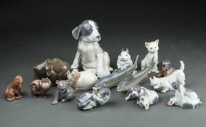 Royal Copenhagen samt Bing Grøndahl. Femten figurer af Porcelæn. 15