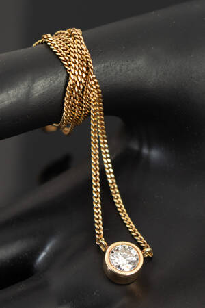Anhänger in Gold mit Diamant