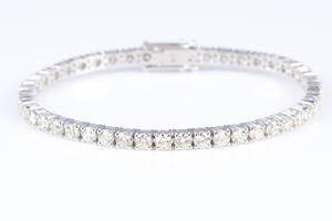 Brillant tennisarmbånd af 14 kt. hvidguld, i alt 7.23 ct