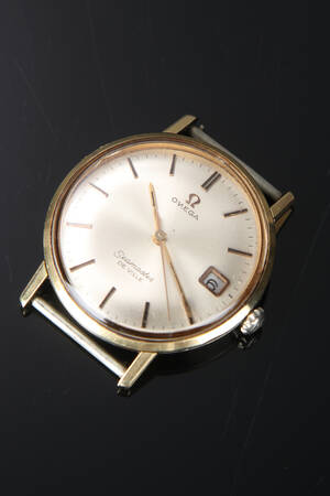 Omega Seamaster de Ville. Herrearmbåndsur af af stål med guldkappe, 1960erne