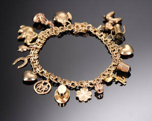 Charms armbånd af guld, ca. 29 gram