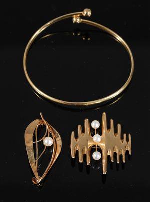 Armband och 2 broscher i 18k guld 3