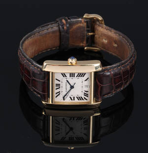 Cartier Tank Française. Herreur i 18 kt. guld med original rem og spænde, 1990erne