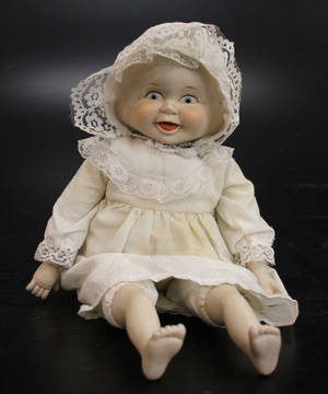 Docka, porslin, 3 ansikten, 1900-talets första del