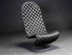 Verner Panton. Loungestol af sort læder, system 1-2-3