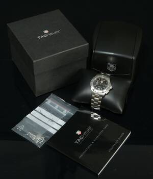 Tag Heuer, herrearmbåndsur, model Aquaracer Alarm, quartz, rustfrit stål, i Tag Heuer æsker