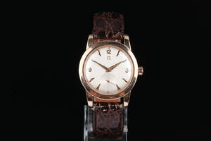 Omega herrearmbåndsur af stål med guldkappe, 1950erne