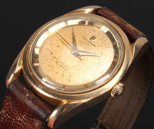 Vintage Universal Geneve herrearmbåndsur af 18 kt.