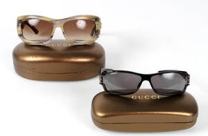 Gucci. To par solbriller med originale etuier. 2