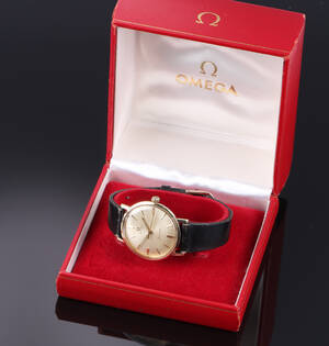 Omega Seamaster. Vintage herreur i stål med guldkappe, 1960erne