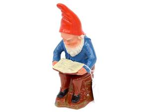 Figurin, tomte läser