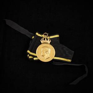 Medalj, 18 k