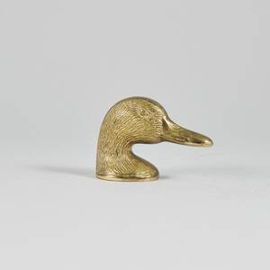 Kapsylöppnare, andhuvud i gulmetall