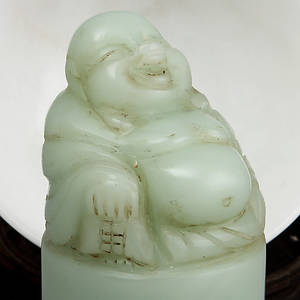 BUDDHAFIGUR samt SKÅL, sten, Kina, 1900-tal.