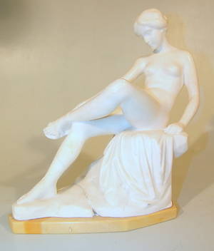 ERNST SEGER. Sitzender Frauenakt eine Sandale bindend, um 1900.