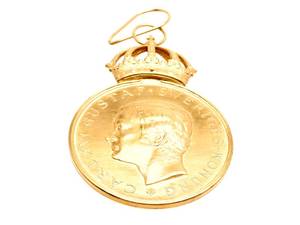 Medalj 18K med