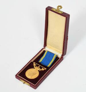Medalj, 23-k guld
