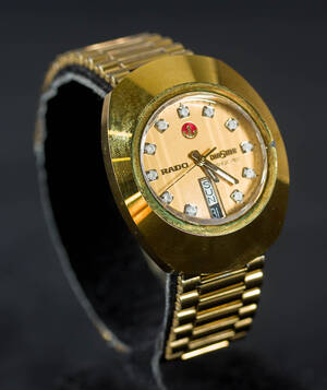 Rado Diastar, magic 40, forgyldt herrearmbåndsur.