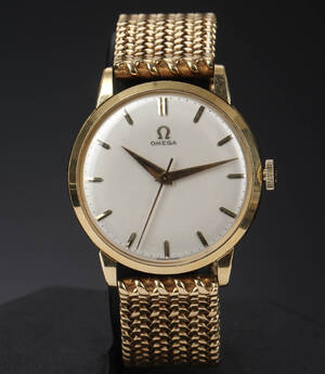 Vintage Omega herrearmbåndsur af 18 kt. guld.