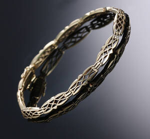 E. L. Weimann, København. Armlænke af 14 kt. guld, ca. 1930erne