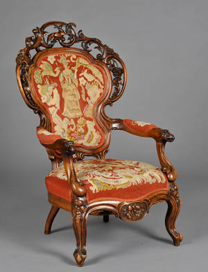 Stor Nyrococo armstol af udskåret nød, ca. 1850
